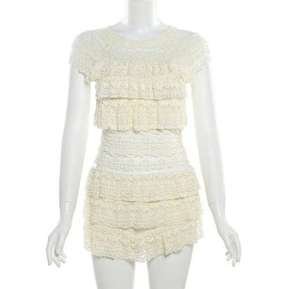 EtherealBe see through tassel skirt set in cream with layered ruffles and fitted design