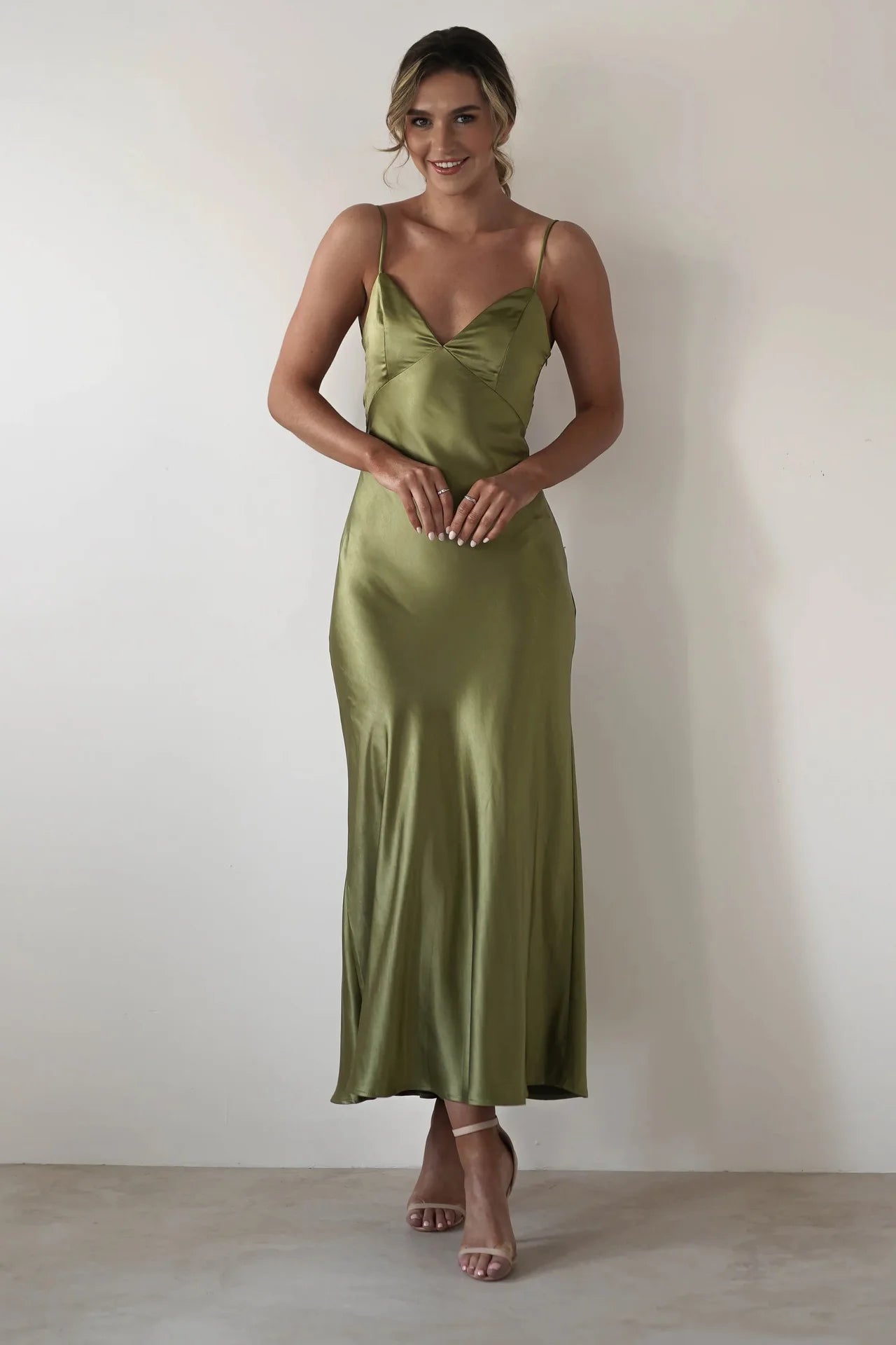 EtherealBe sexy satin halter dress in olive green with a sleek fit and elegant design