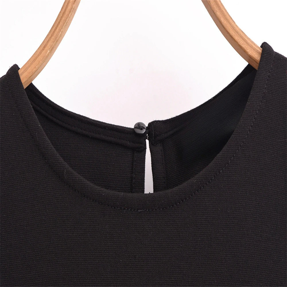 Close-up of the neckline detail on a sleeveless chic cocktail dress from EtherealBe