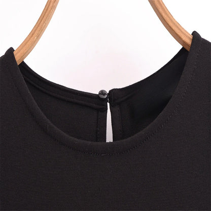 Close-up of the neckline detail on a sleeveless chic cocktail dress from EtherealBe