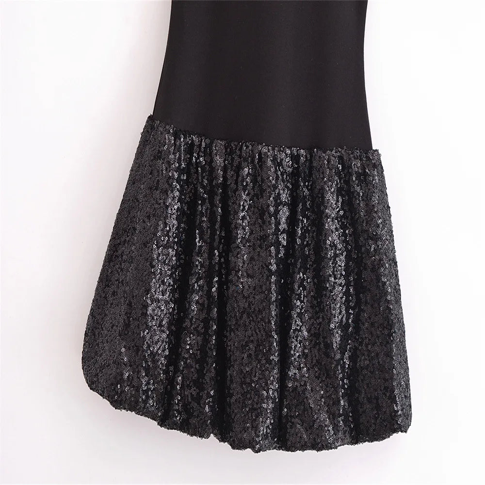 EtherealBe sleeveless chic cocktail dress with a shimmering sequin skirt for elegant occasions