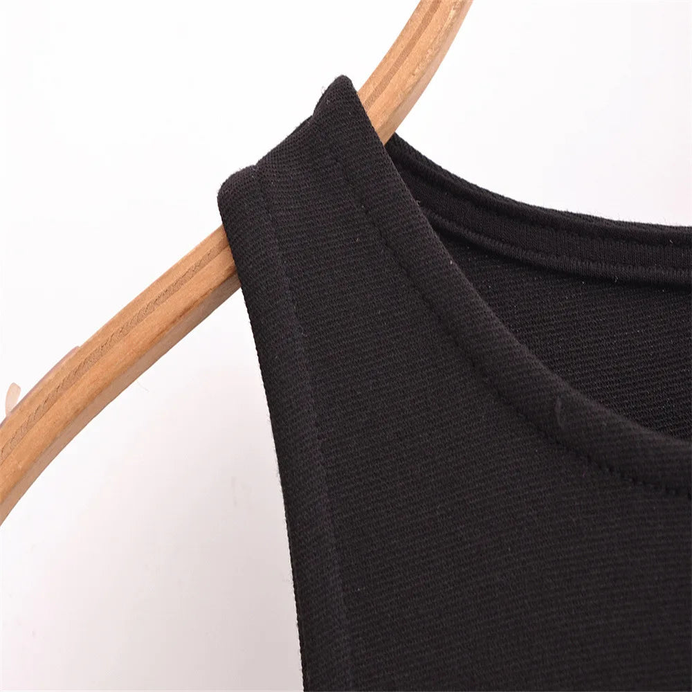 Close-up of a black sleeveless chic cocktail dress showcasing its elegant neckline and fabric texture