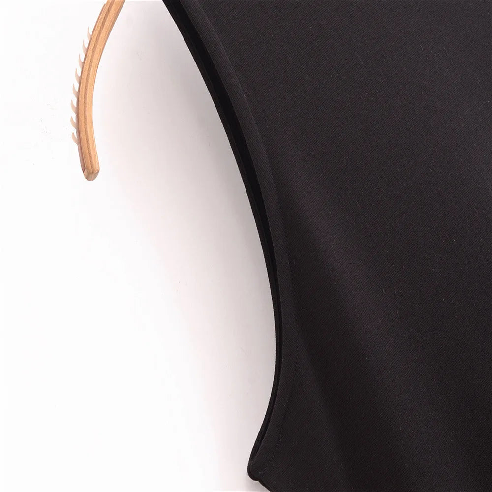 EtherealBe sleeveless chic cocktail dress with elegant design and smooth fabric detail