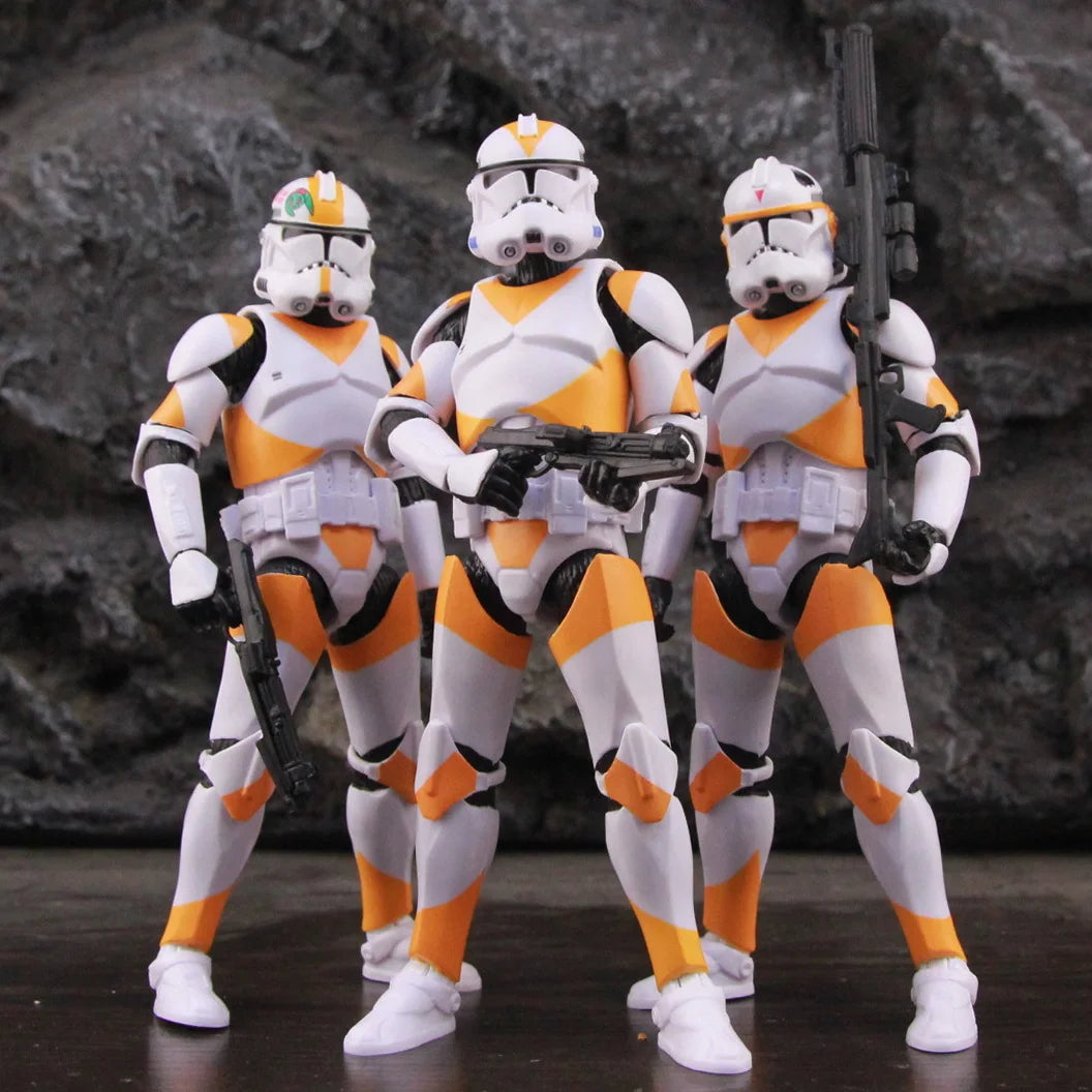Star Wars 212th Clone Trooper action figure trio in orange and white armor with blasters