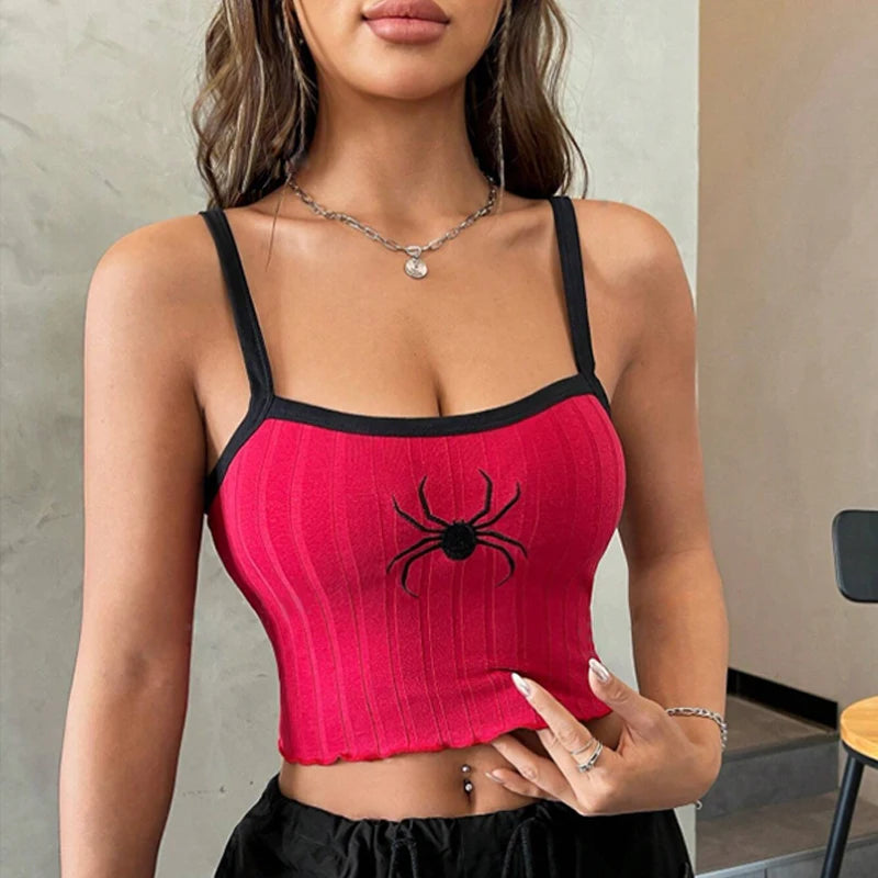 Model wearing harajuku punk spider print camisole red ribbed cropped tank with black trim and center spider graphic