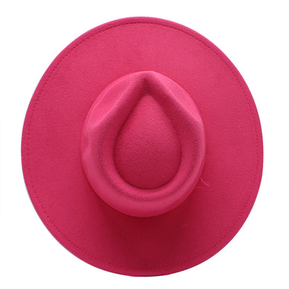 Stylish wide brim felt fedora in vibrant pink with a unique teardrop crown design