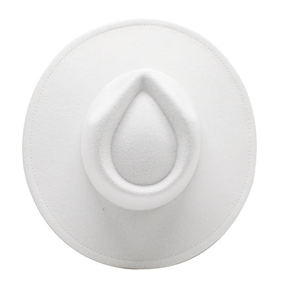Top view of a stylish wide brim felt fedora in white, featuring a unique crown design.