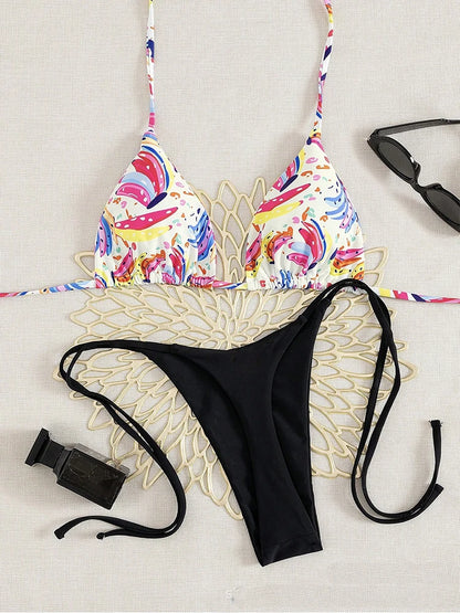 EtherealBe tropical fruit print bikini set with colorful triangle top and black tie side bottoms styled