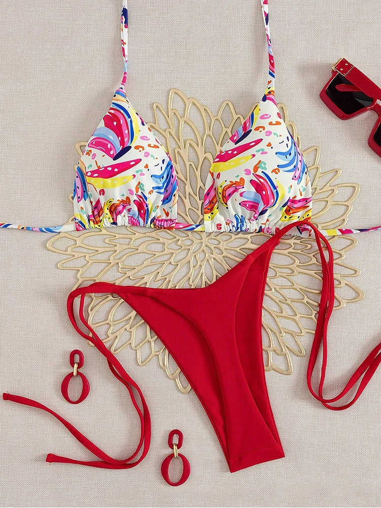 tropical fruit print bikini set with colorful triangle top and solid red high cut tie side bottoms
