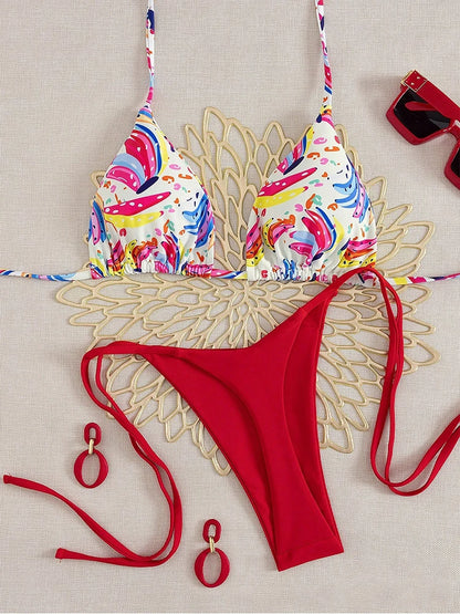 tropical fruit print bikini set with colorful triangle top and solid red high cut tie side bottoms