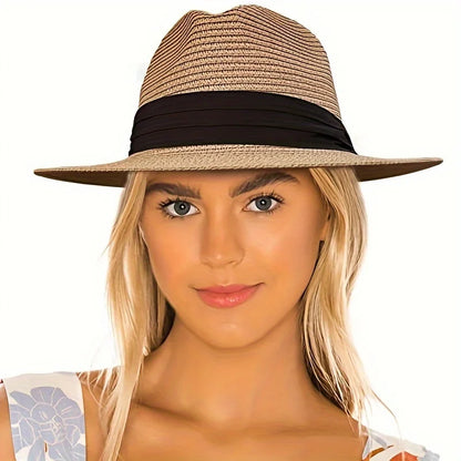 Trendy straw fedora hat with a stylish black band, perfect for summer outings and beach days