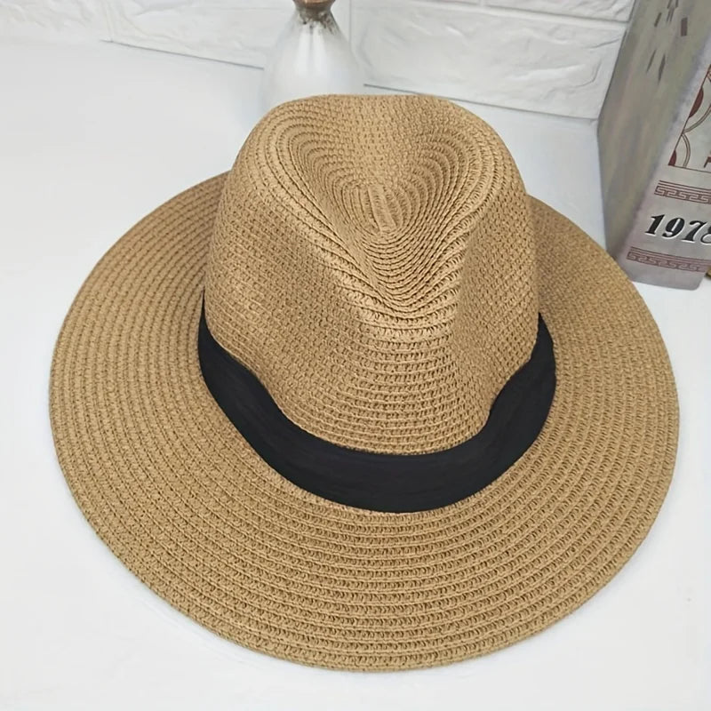 Trendy straw fedora hat with a contrasting black band for a stylish summer look