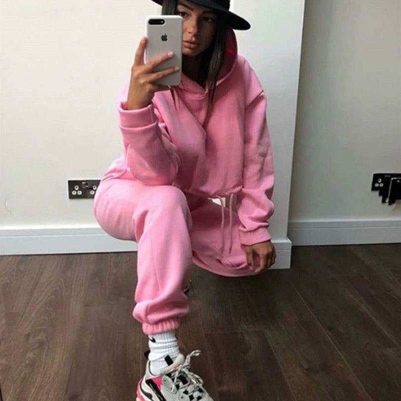 Trendy women's hoodie and joggers set in pink, perfect for casual outings and comfort