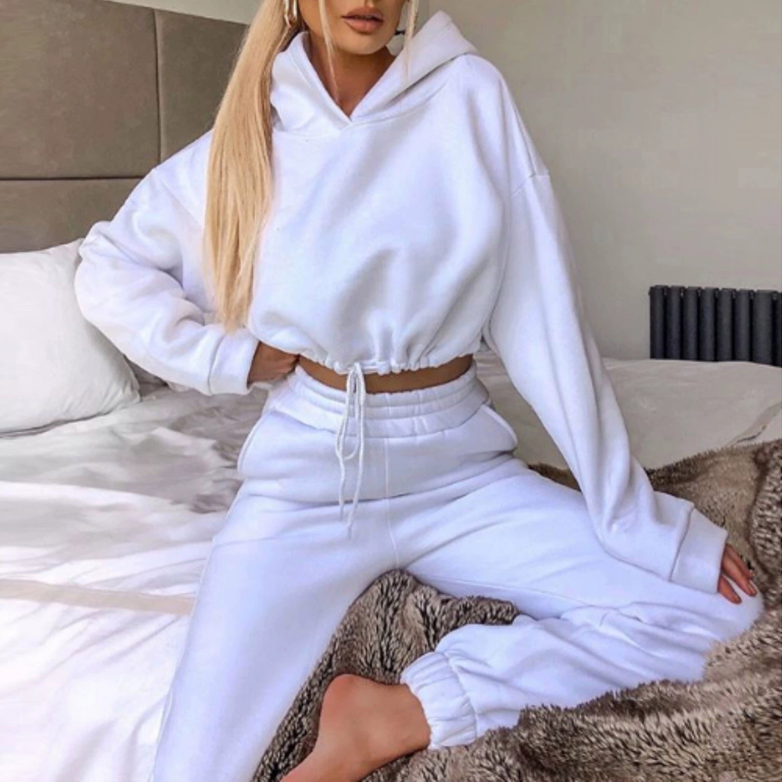 EtherealBe trendy women's hoodie and joggers set in white, featuring a relaxed fit and soft fabric for comfort
