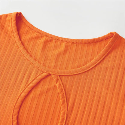 Close-up of the neckline of an orange Velma costume for women with a stylish design