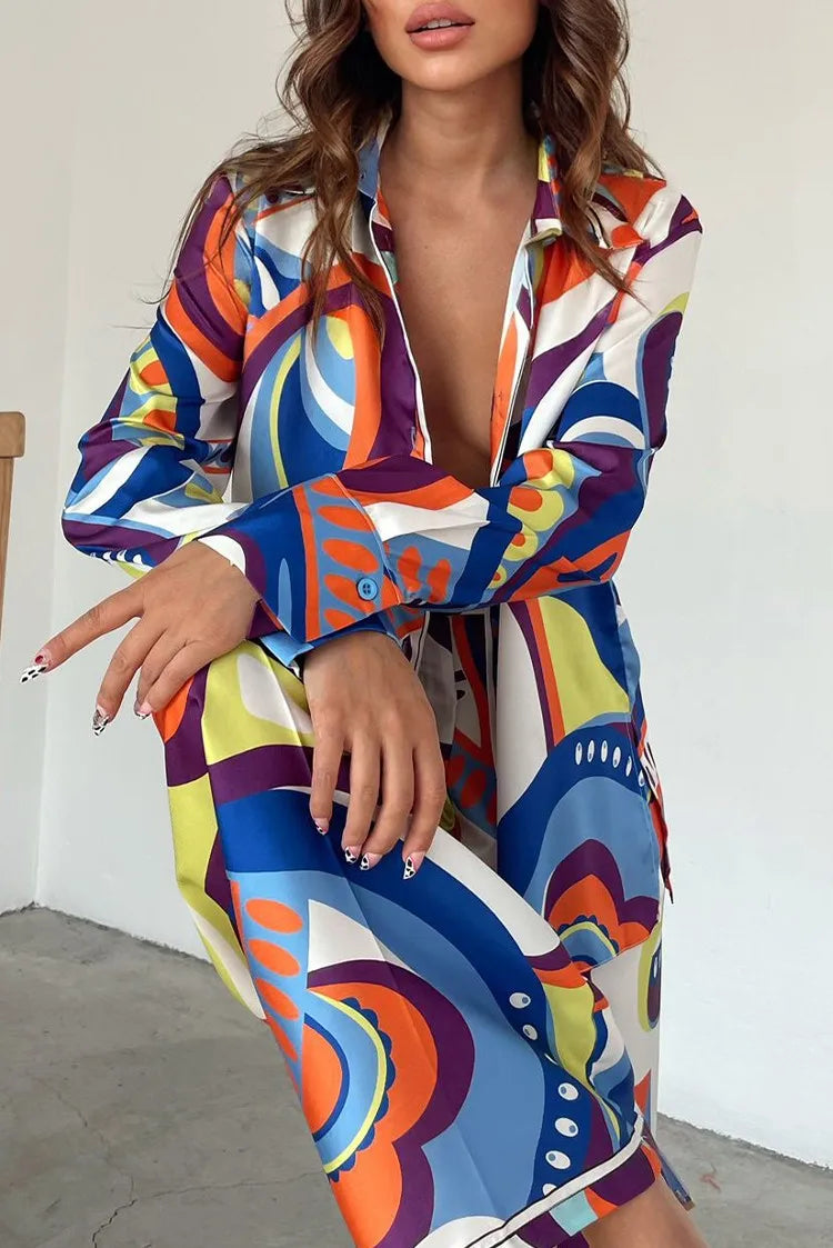 Stylish woman wearing an abstract loose legged 2 piece set for women, featuring vibrant colors and a modern design.