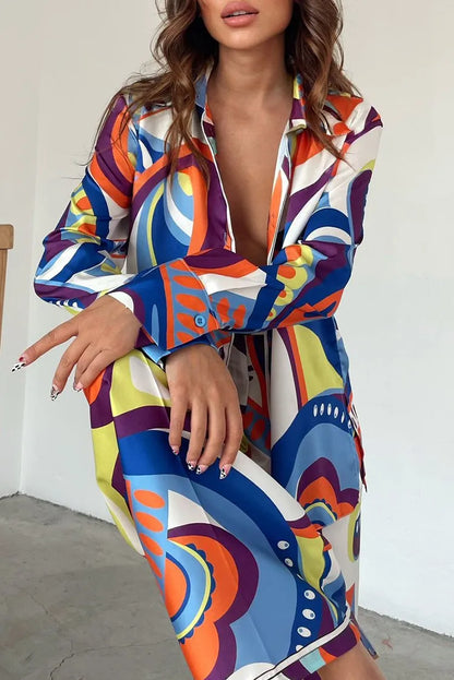 Stylish woman wearing an abstract loose legged 2 piece set for women, featuring vibrant colors and a modern design.