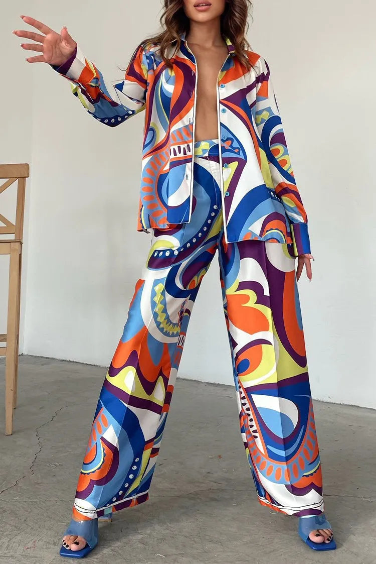 Colorful abstract loose legged 2 piece set for women featuring a stylish zip-up top and matching pants