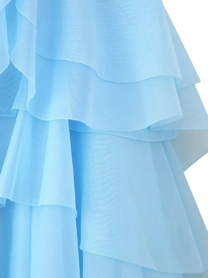 EtherealBe elegant layered decorative dress in soft blue with delicate ruffles for a graceful look