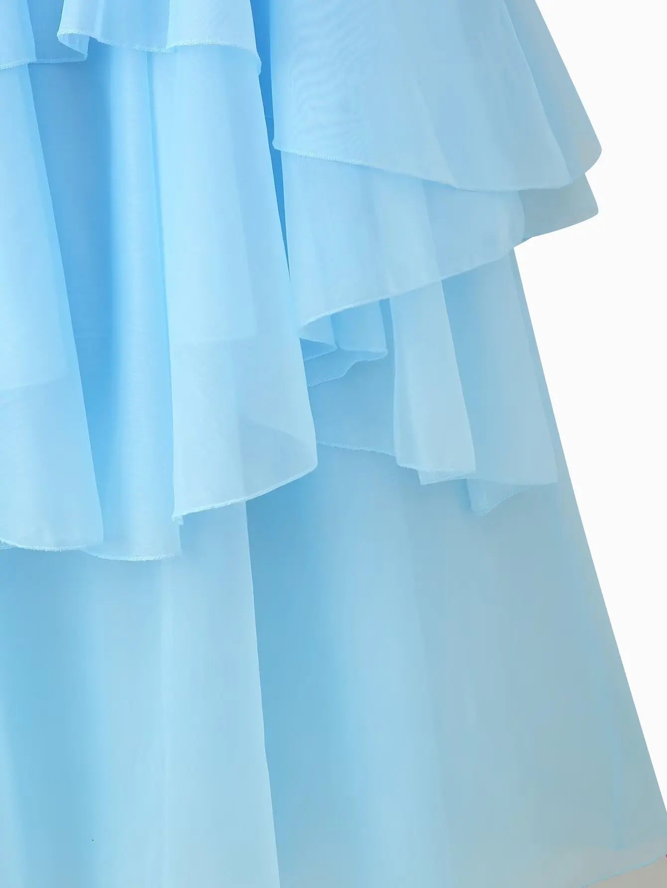 EtherealBe elegant layered decorative dress in soft blue with flowing tiered fabric