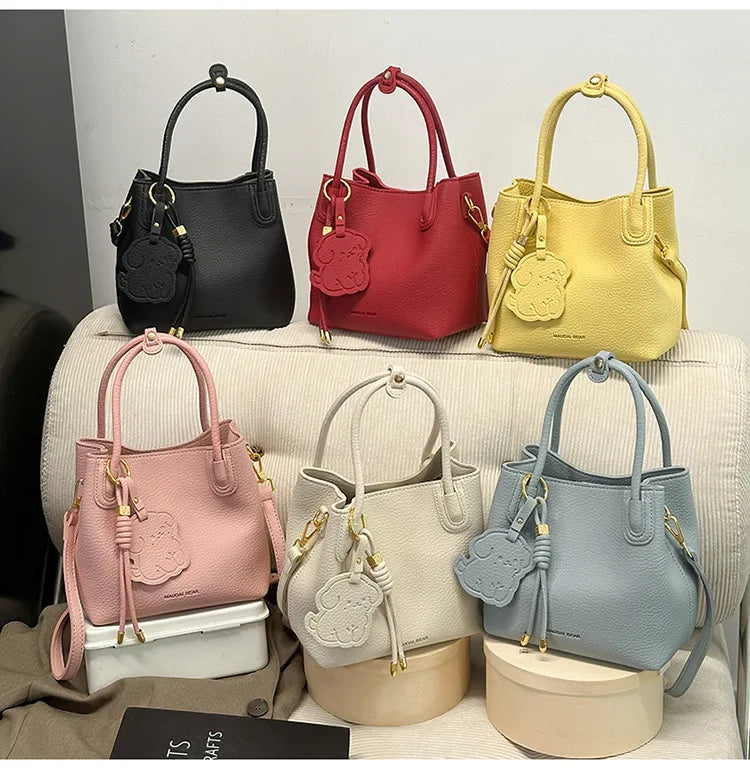 Colorful EtherealBe fashionable work bags for women in various shades and styles with unique charm tags