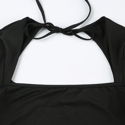 EtherealBe black long sleeve mini dress with open back tie bow and square cutout in stretch fabric