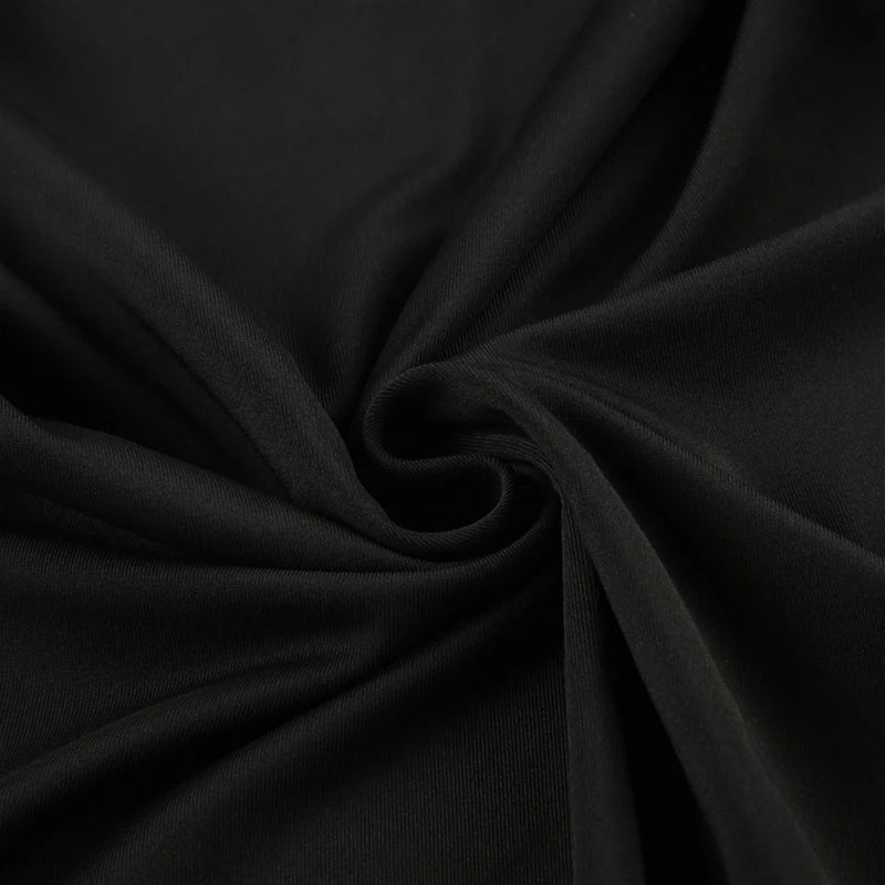 EtherealBe black long sleeve mini dress soft stretch fabric closeup showing smooth knit texture and drape