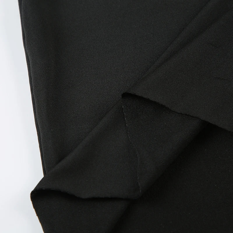 EtherealBe close up of black long sleeve mini dress knit fabric showing folded hem detail