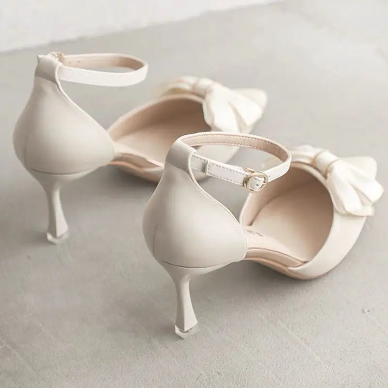 EtherealBe white butterfly stiletto heel with elegant bow detail for stylish occasions