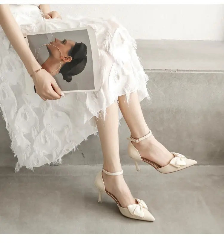EtherealBe white butterfly stiletto heels with elegant bow detail, perfect for formal occasions