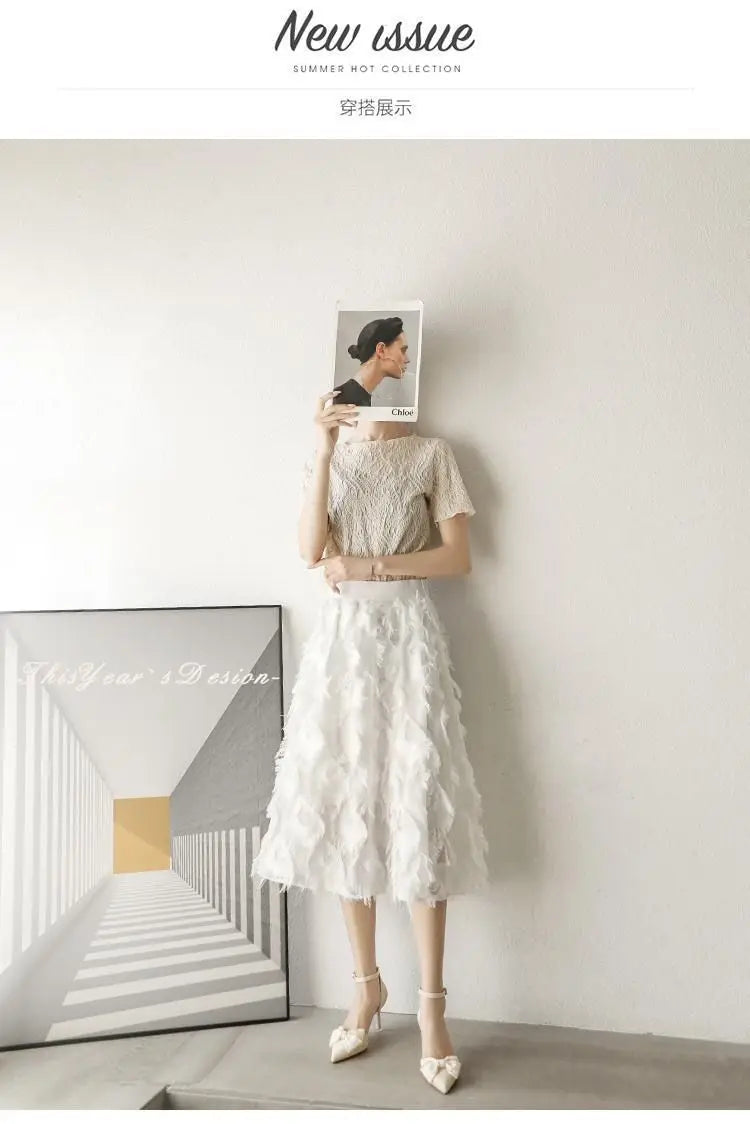 Elegant model wearing a white dress and white butterfly stiletto heels, showcasing a chic summer look