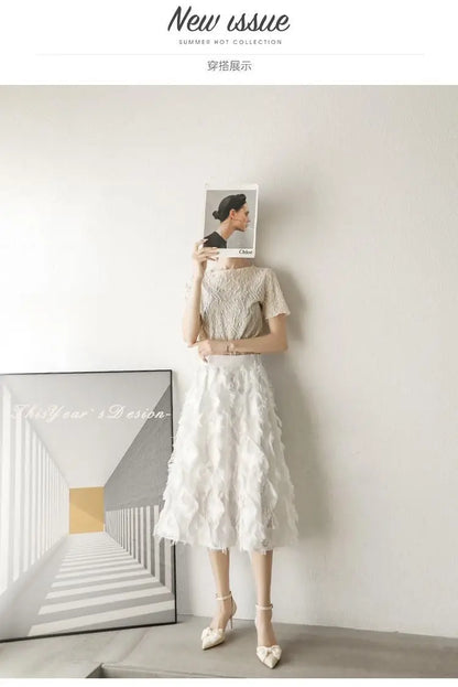 Elegant model wearing a white dress and white butterfly stiletto heels, showcasing a chic summer look