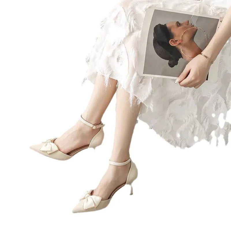 EtherealBe white butterfly stiletto heels with a chic bow detail for elegant occasions