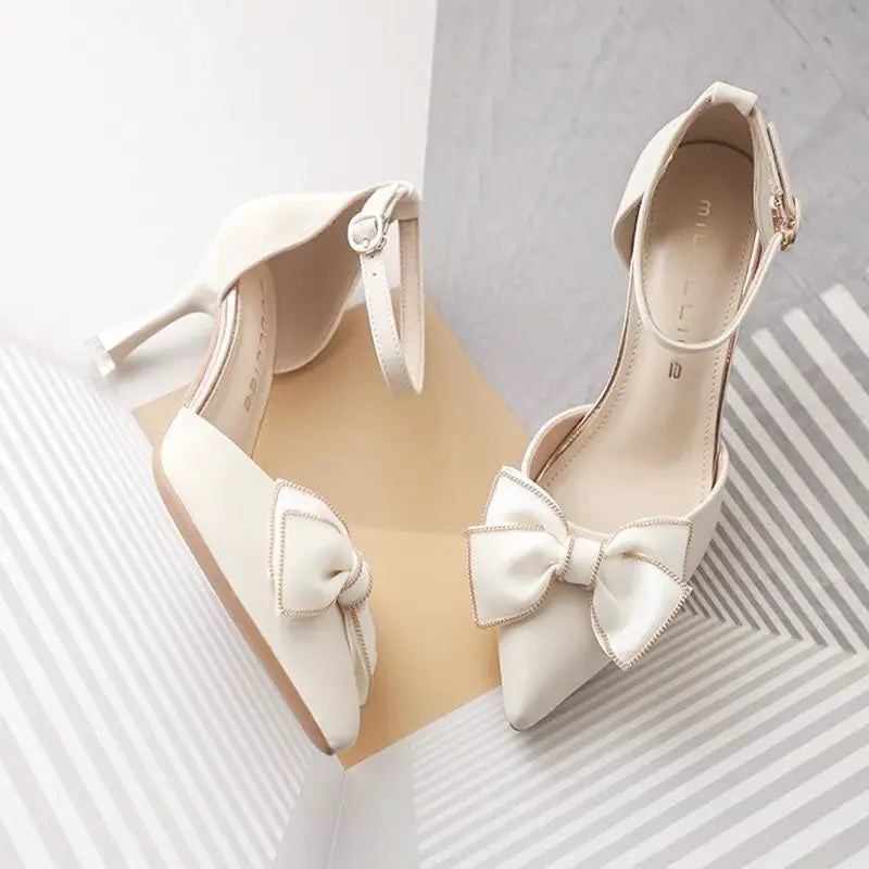EtherealBe white butterfly stiletto heels featuring elegant bows and a stylish design for special occasions
