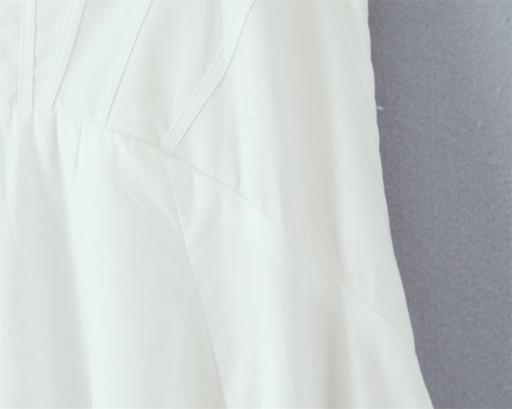 Elegant white lace panel midi dress for women showcasing delicate design and flattering fit