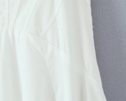 Elegant white lace panel midi dress for women showcasing delicate design and flattering fit