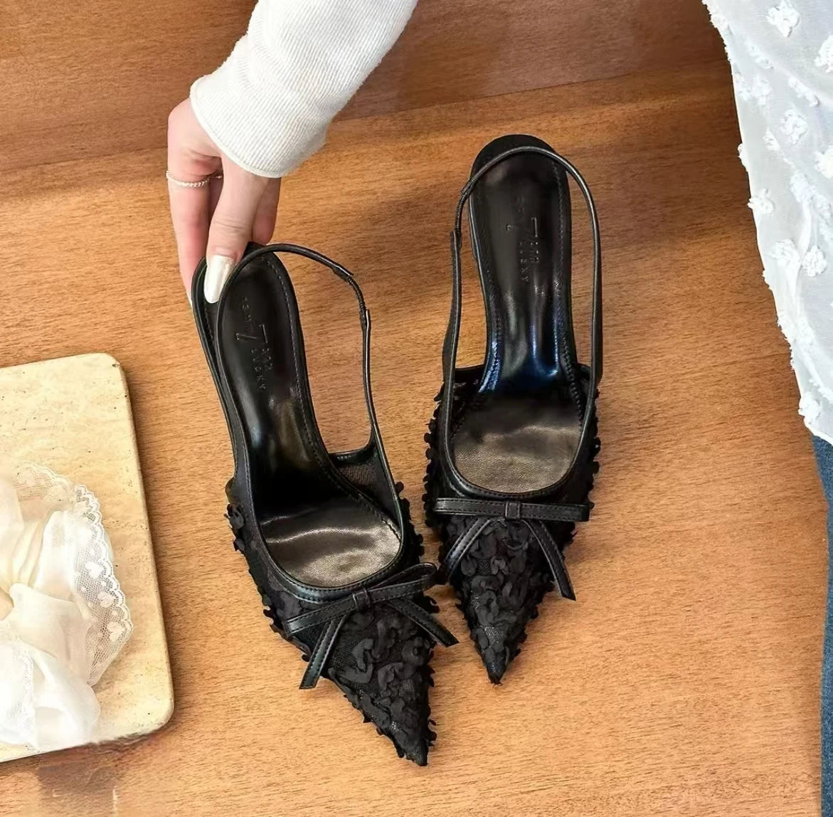 Stylish black lace slingback heels women featuring pointed toes and floral design details
