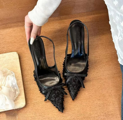 Stylish black lace slingback heels women featuring pointed toes and floral design details