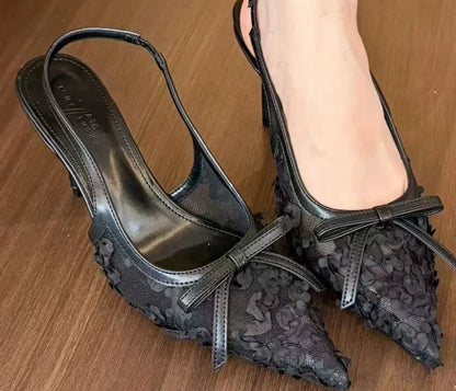 Elegant white lace slingback heels women with a delicate bow and stylish pointed toe design