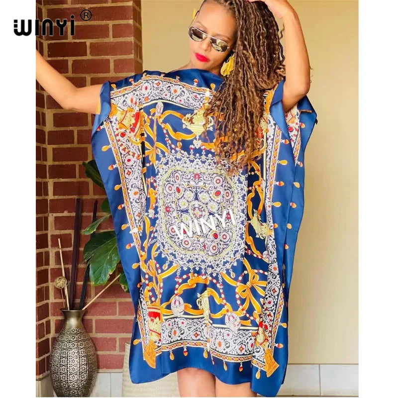 Stylish long femme chic vestido for women with vibrant blue and gold pattern, perfect for summer outings