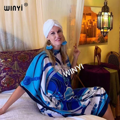 Blue patterned long femme chic vestido for women styled in a relaxed setting