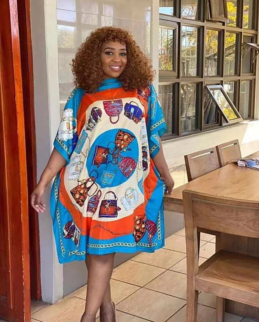 Brightly colored long femme chic vestido for women featuring unique handbag prints and a loose fit