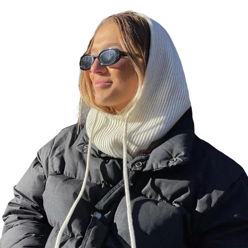 Stylish woman wearing an EtherealBe knit pullover balaclava for women in soft white color
