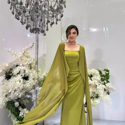 Elegant women's fairy style formal gown in olive green with flowing sleeves and a chic silhouette