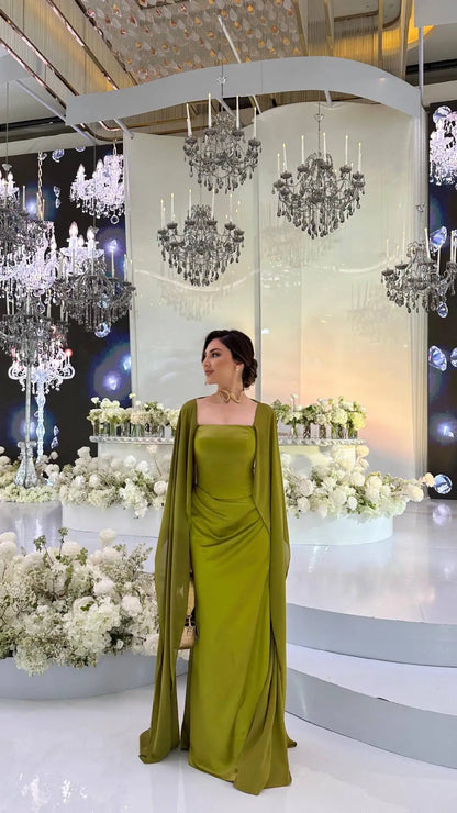 Ethereal women's fairy style formal gown in olive green with flowing sleeves, perfect for elegant occasions
