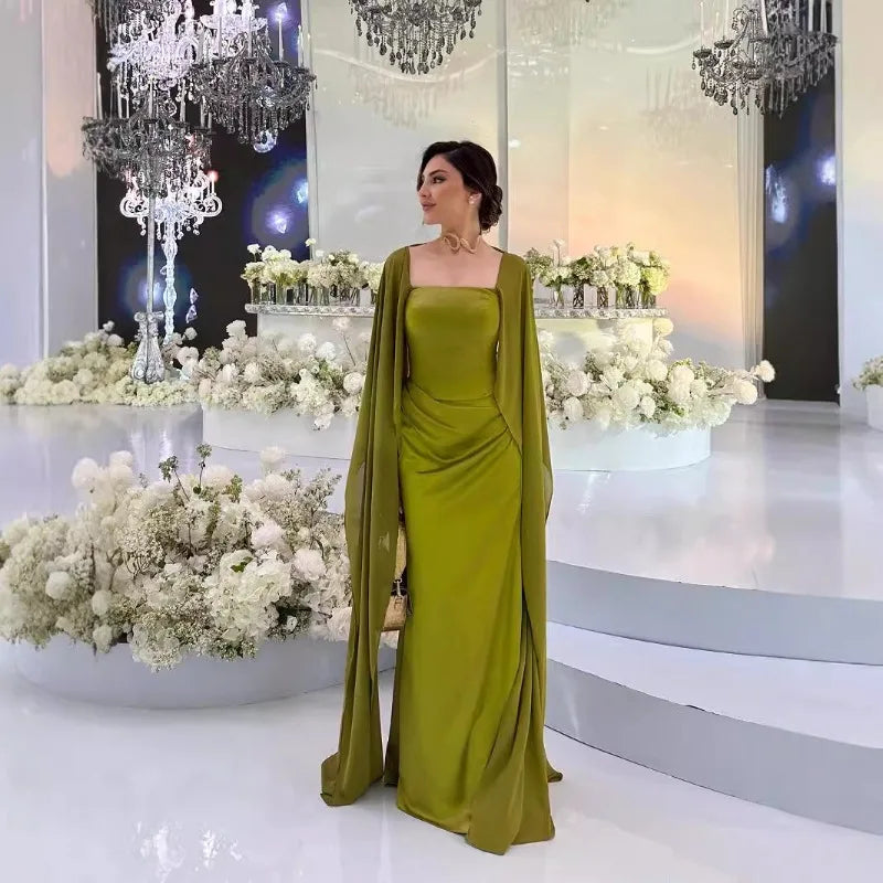 Ethereal women's fairy style formal gown in green, featuring elegant drapes and a square neckline