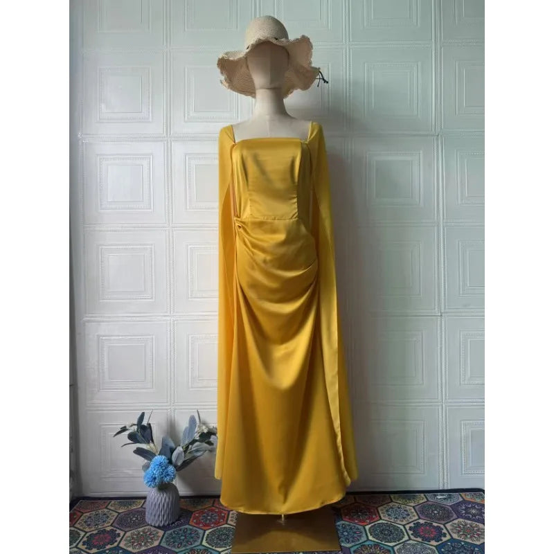 EtherealBe women's fairy style formal gown in yellow with elegant draping and a hat accessory