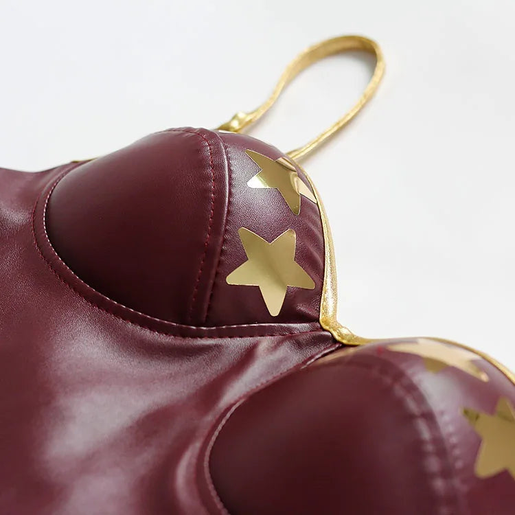 Detailed close-up of the maroon Wonder Woman cosplay costume with gold star accents