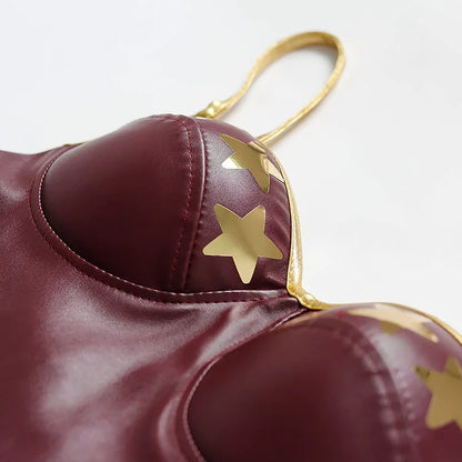 Detailed close-up of the maroon Wonder Woman cosplay costume with gold star accents