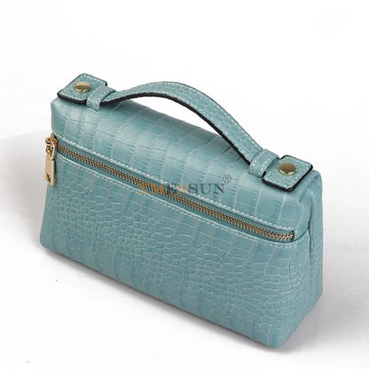 EtherealBe luxurious faux crocodile makeup bag in teal with a stylish handle and gold zipper